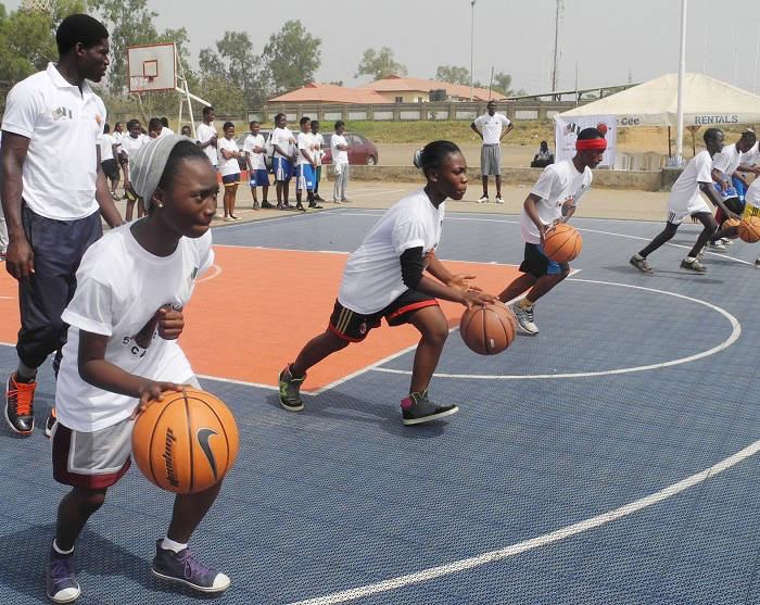 Children participating in basketball clinic