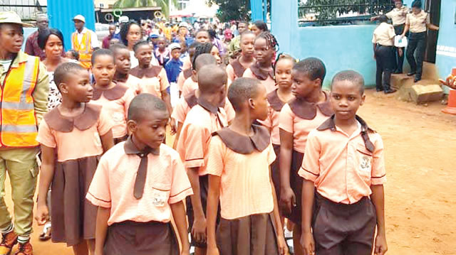 Schoolchildren at the programme