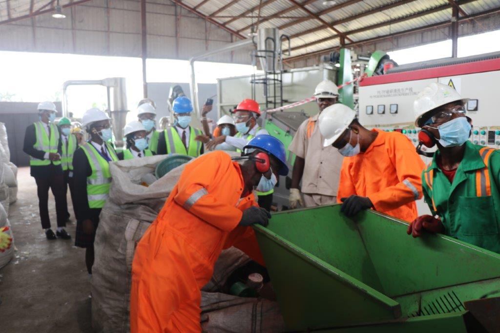 students of Bloombreed Highschool take a tour of TURN Plastic Recycling plant
